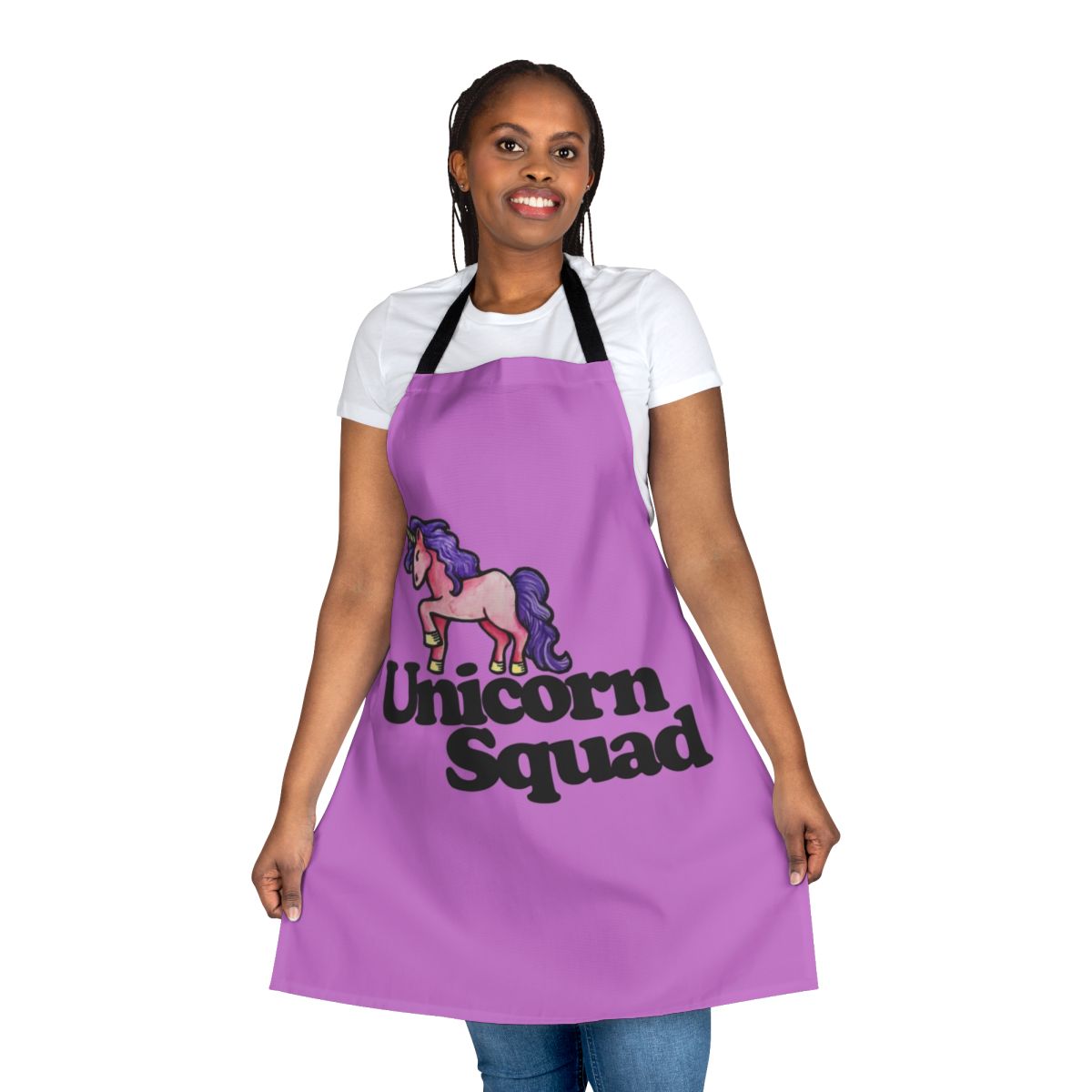 A pink and white unicorn-themed apron with an enchanting design