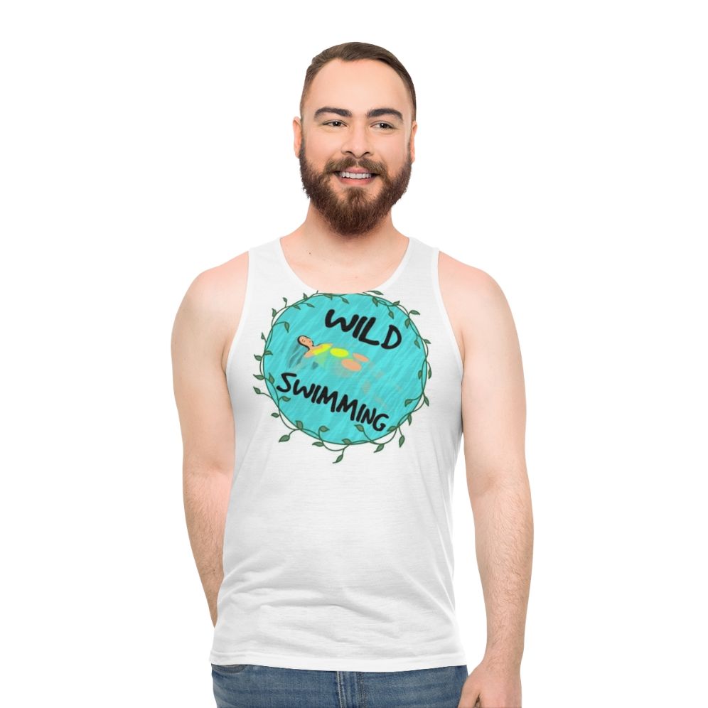 Model wearing the Wild Swimming Unisex Tank Top in a natural outdoor setting