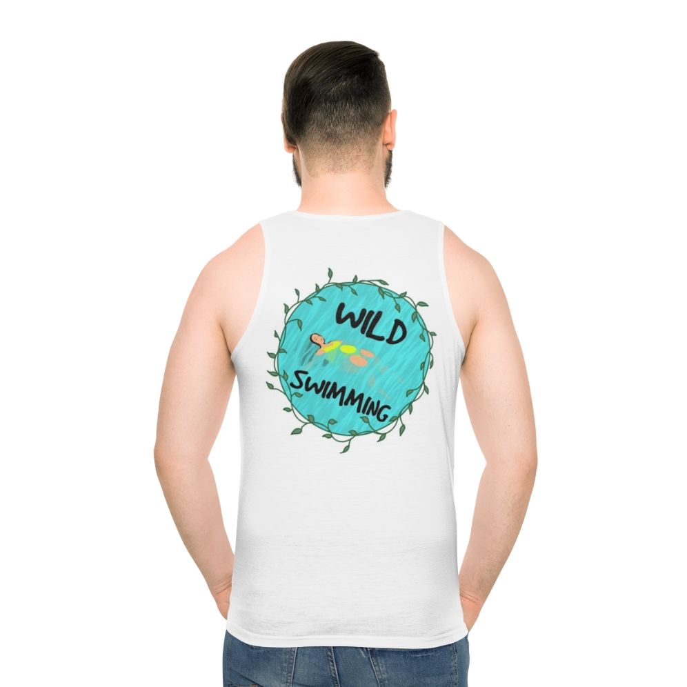 Model wearing the Wild Swimming Unisex Tank Top in a natural outdoor setting