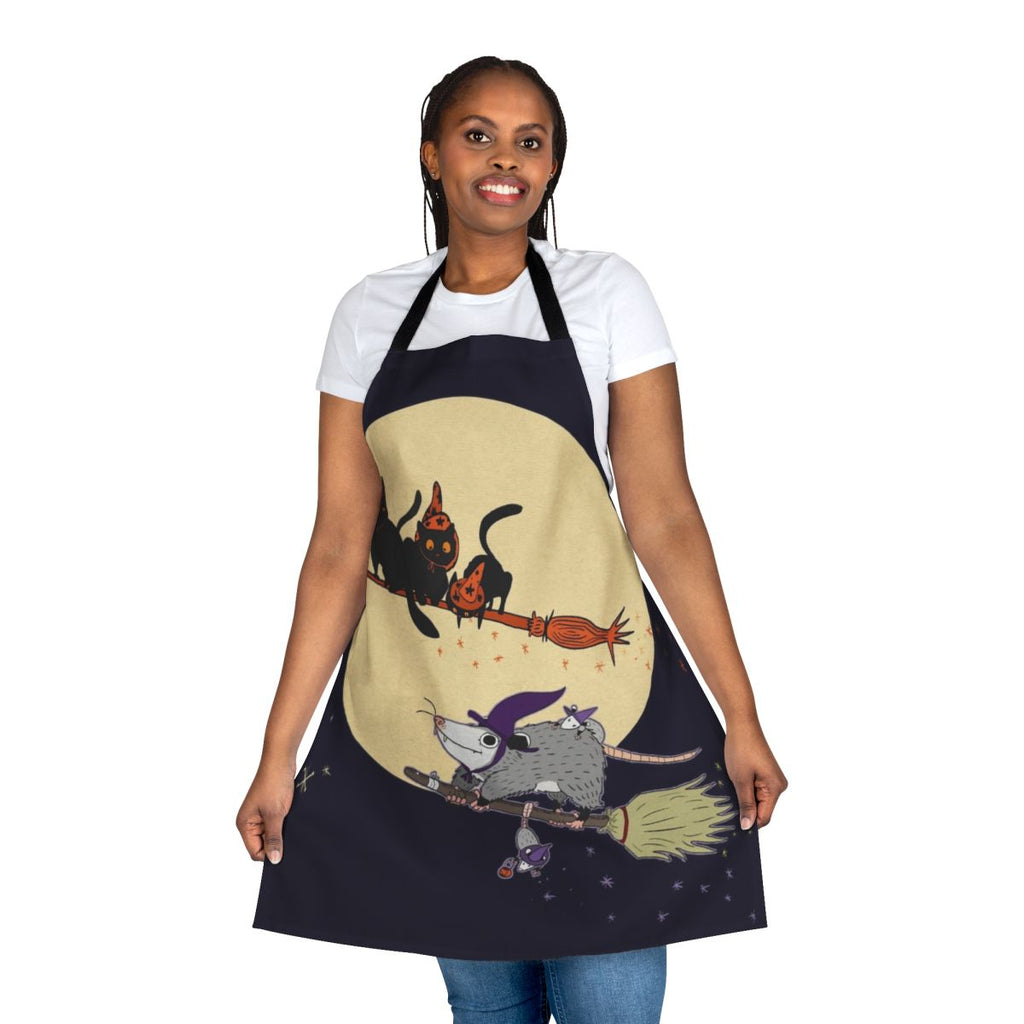 A whimsical apron featuring a cartoon opossum or black cat, perfect for witches, Halloween, and everyday wear.