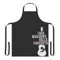 Woody Guthrie inspired anti-fascist apron with text "This Machine Doesn't Kill Fascists"