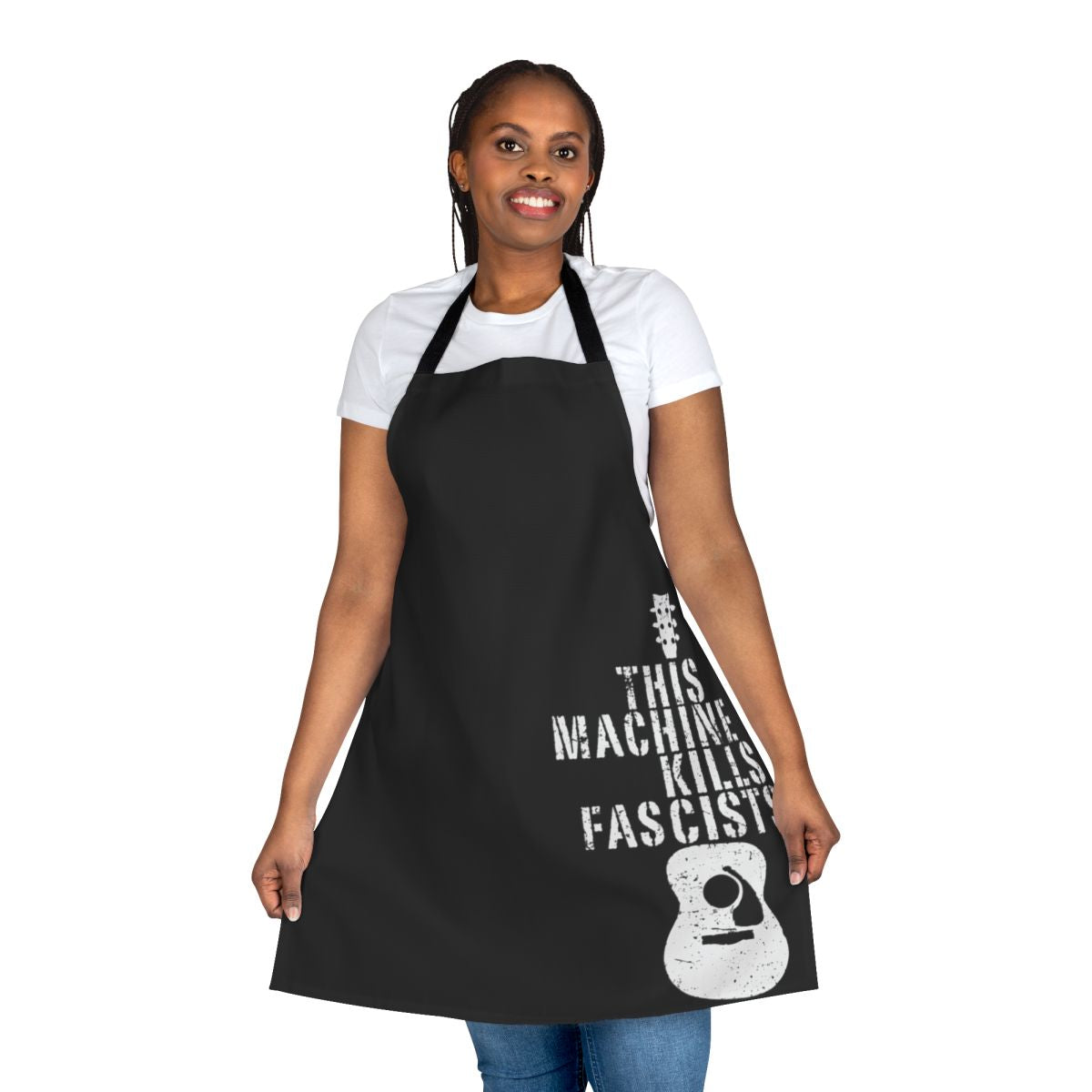 Woody Guthrie inspired anti-fascist apron with text "This Machine Doesn't Kill Fascists"