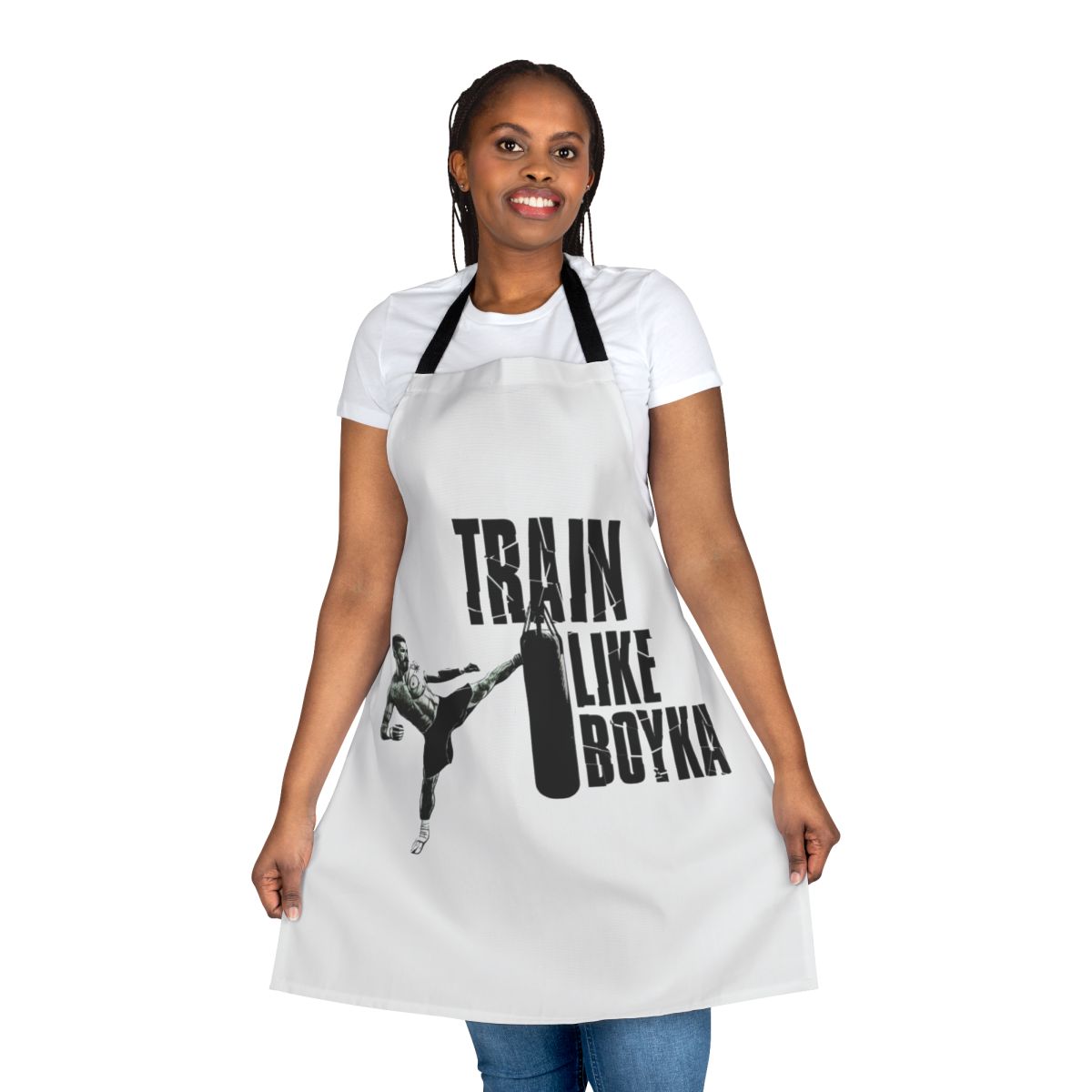Person wearing a black apron with the text "Train Like Boyka" printed on it