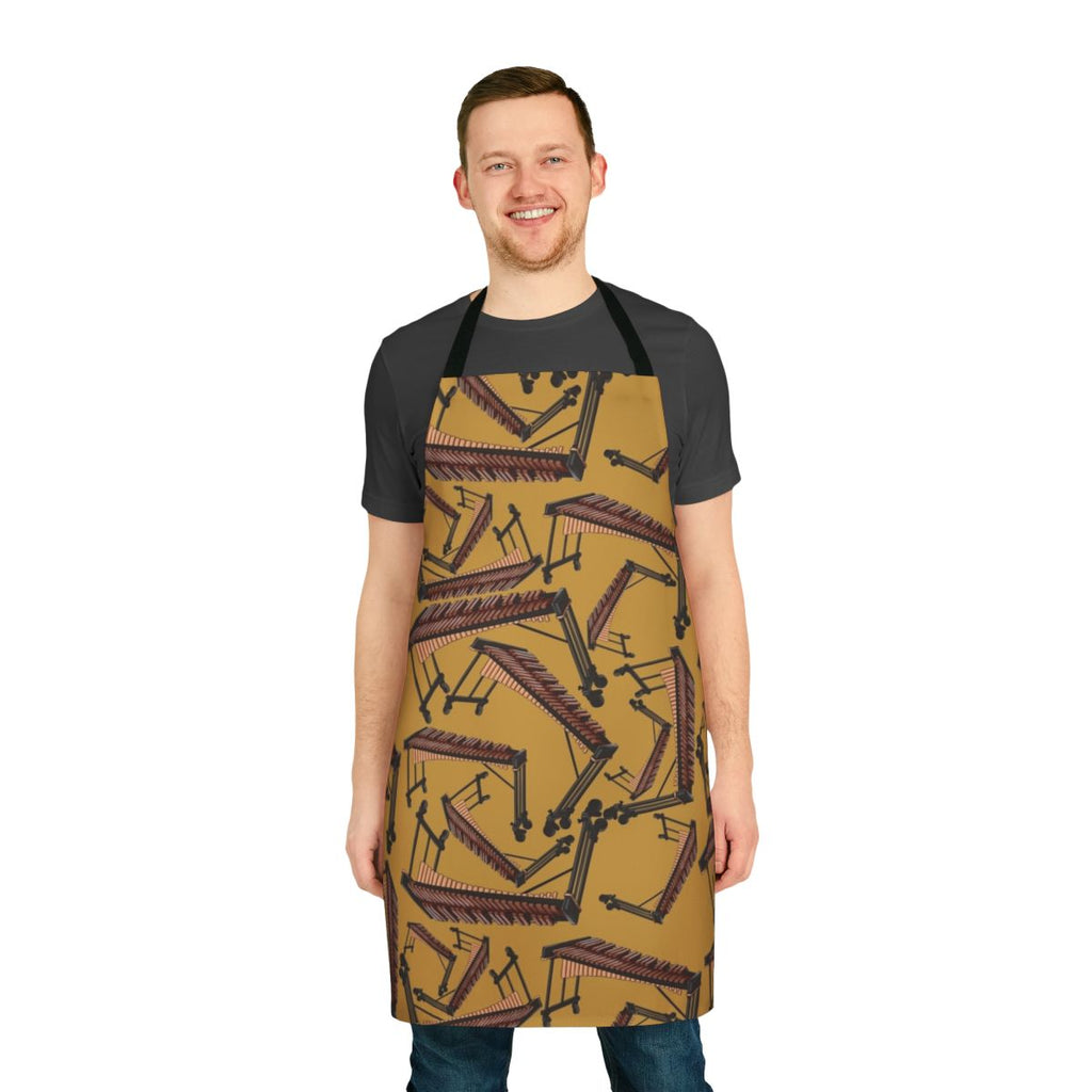 Yellow apron featuring a vibrant xylophone musical instrument pattern