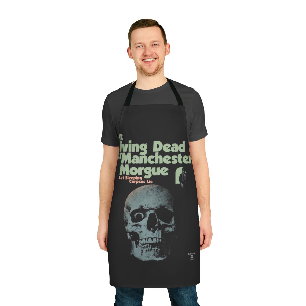 The Living Dead at Manchester Morgue inspired zombie apron with skulls, corpses, and gothic design